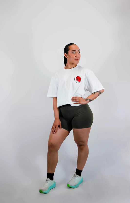 Full-body shot of a model wearing the Classic Graphic Buff Tee from the front, highlighting its versatile fit and design.