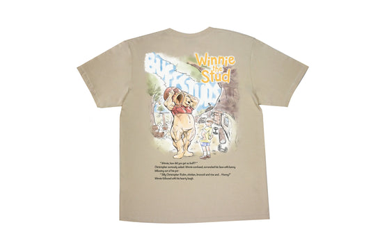Flat lay of the Classic Graphic Buff Tee, showing the back with the bold Winnie the Stud graphic design.